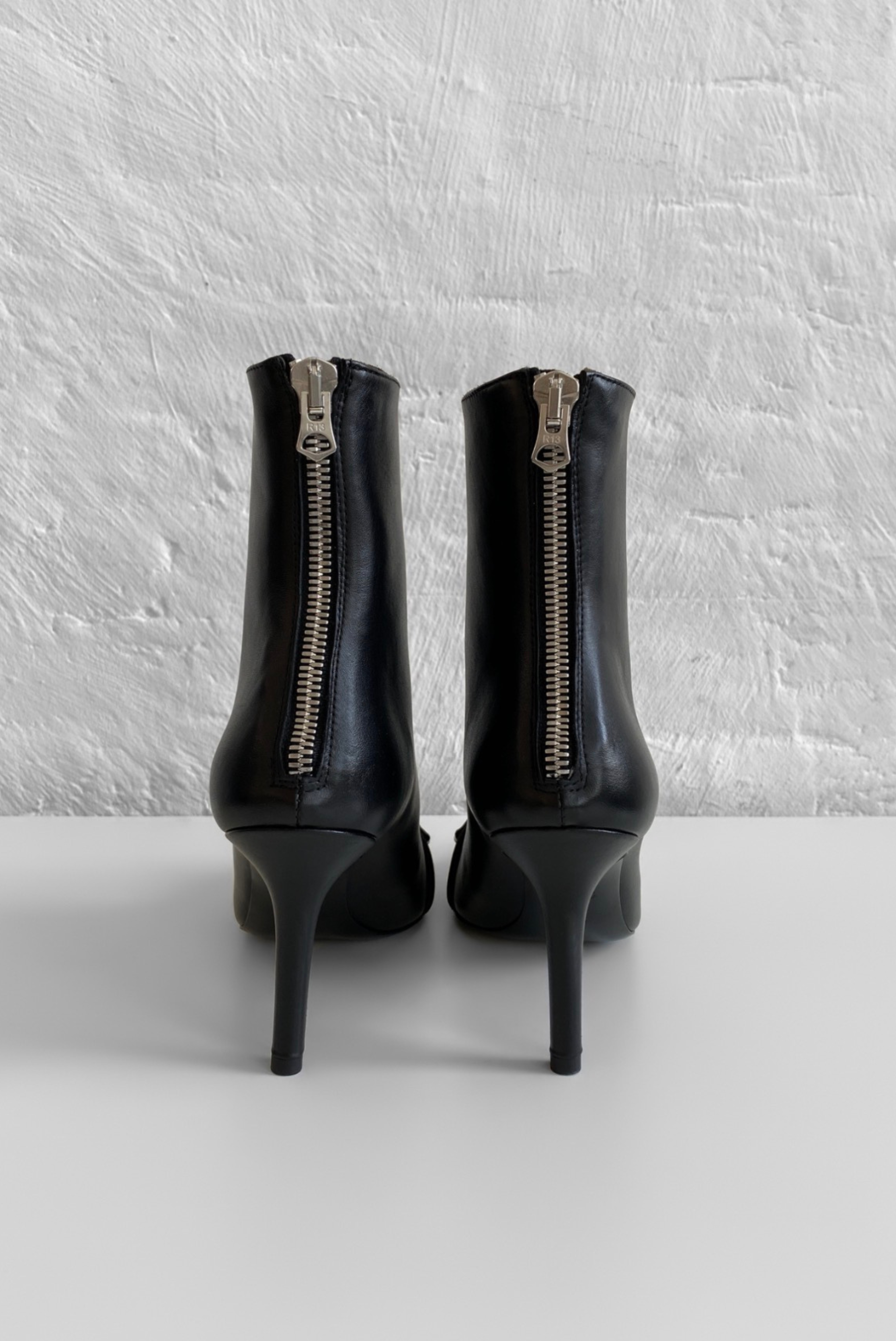 Skinny Ankle Heeled Boot With Ring
